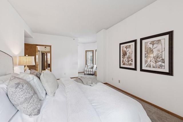 1235 Yale Pl Unit 207, Minneapolis, MN 55403 - bedroom featuring baseboards and carpet