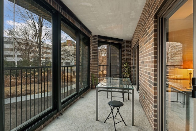 1235 Yale Pl Unit 207, Minneapolis, MN 55403 - sunroom with a healthy amount of sunlight