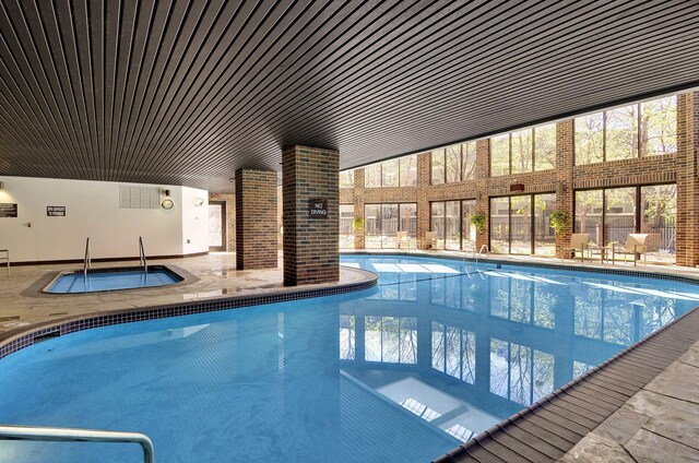 1235 Yale Pl Unit 207, Minneapolis, MN 55403 - community pool featuring a patio and an indoor hot tub