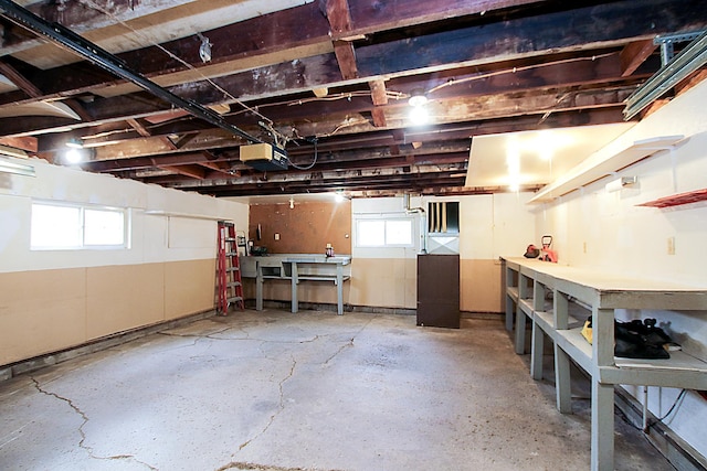 207 Astro Blvd W, Cosmos, MN 56228 - below grade area featuring a workshop area and plenty of natural light