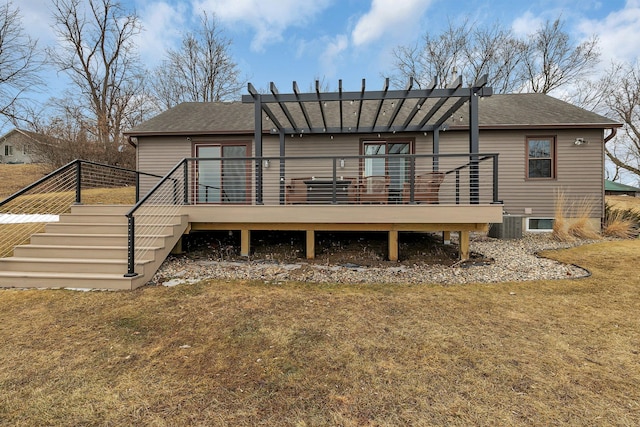 616 Lake Cowdry Rd NW, Alexandria, MN 56308 - back of property with a wooden deck, stairway, a shingled roof, a pergola, and a lawn