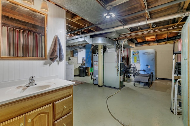 616 Lake Cowdry Rd NW, Alexandria, MN 56308 - below grade area with washer / dryer and gas water heater