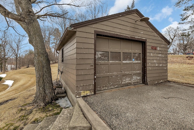 616 Lake Cowdry Rd NW, Alexandria, MN 56308 - detached garage with asphalt driveway