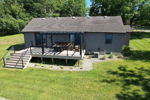 616 Lake Cowdry Rd NW, Alexandria, MN 56308 - rear view of house with a deck, a yard, a shingled roof, and a chimney