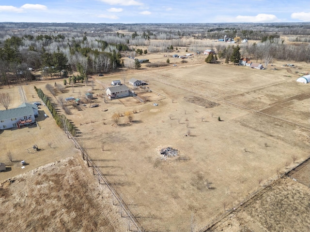 birds eye view of property featuring a rural view