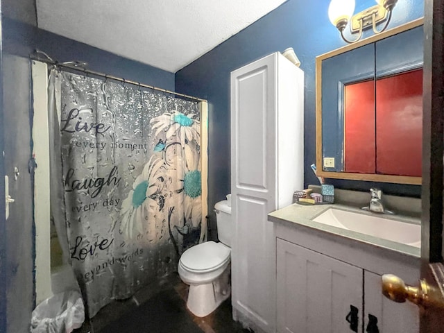bathroom featuring vanity, shower / bathtub combination with curtain, and toilet
