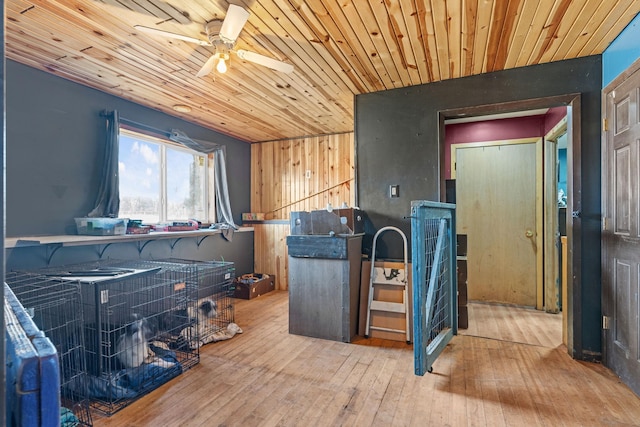 misc room featuring ceiling fan, wooden ceiling, and hardwood / wood-style flooring
