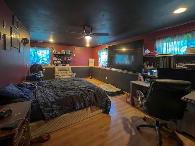 bedroom with recessed lighting, a ceiling fan, and wood finished floors