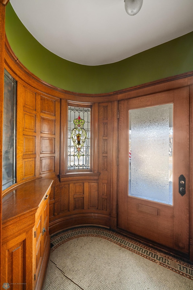 foyer entrance featuring plenty of natural light