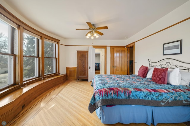 bedroom featuring light wood-style flooring
