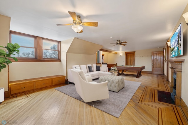living room with baseboards, billiards, wood finished floors, and a ceiling fan