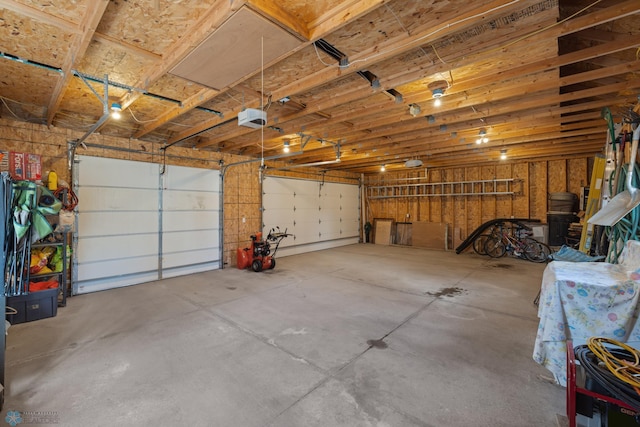 garage featuring a garage door opener