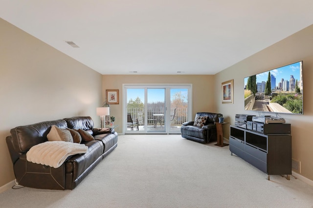 8651 Basswood Rd Unit 203, Eden Prairie, MN 55344 - carpeted living room featuring visible vents and baseboards