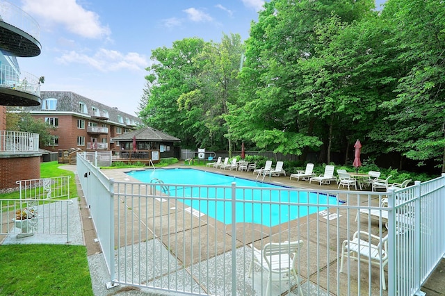 8651 Basswood Rd Unit 203, Eden Prairie, MN 55344 - community pool with fence and a patio area
