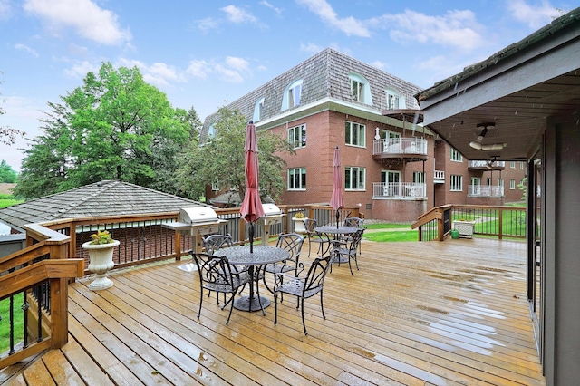 8651 Basswood Rd Unit 203, Eden Prairie, MN 55344 - wooden deck featuring outdoor dining space