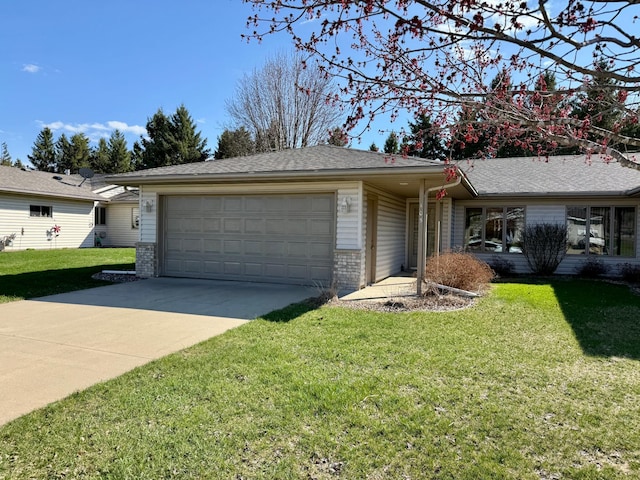 single story home with an attached garage, a front lawn, brick siding, and concrete driveway