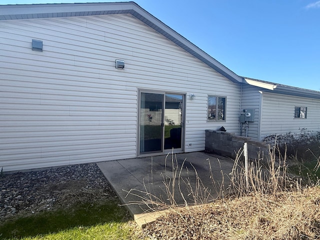 back of house with a patio area