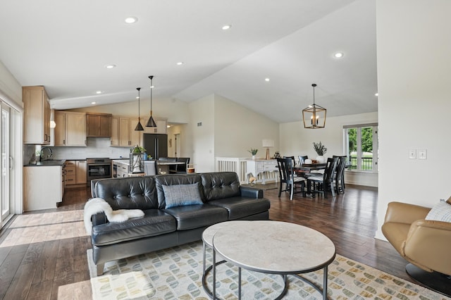 27901 Teale Ave, New Prague, MN 56071 - living area featuring wood finished floors, recessed lighting, and high vaulted ceiling