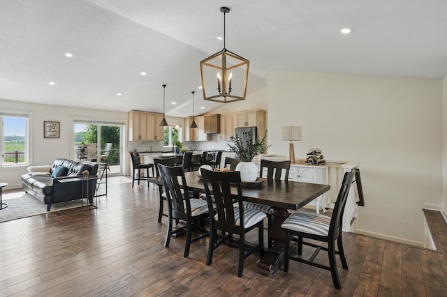 27901 Teale Ave, New Prague, MN 56071 - dining room featuring vaulted ceiling, dark wood finished floors, recessed lighting, a chandelier, and baseboards