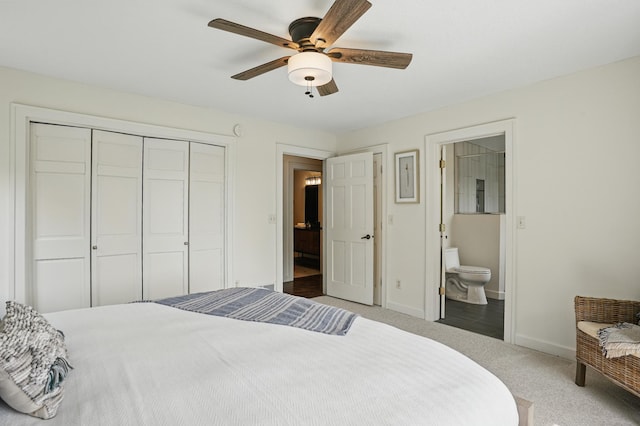 27901 Teale Ave, New Prague, MN 56071 - bedroom with a closet, carpet flooring, baseboards, connected bathroom, and a ceiling fan