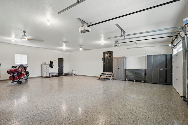 27901 Teale Ave, New Prague, MN 56071 - garage featuring a garage door opener