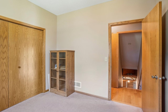 6875 148th Ln NW, Ramsey, MN 55303 - unfurnished bedroom featuring carpet flooring and baseboards