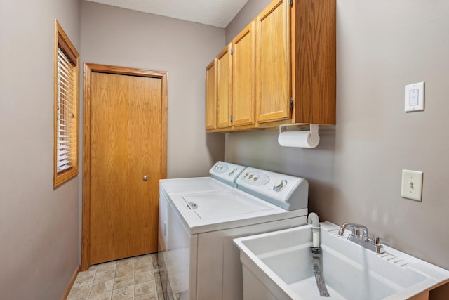 6875 148th Ln NW, Ramsey, MN 55303 - washroom with washer and dryer, cabinet space, and baseboards