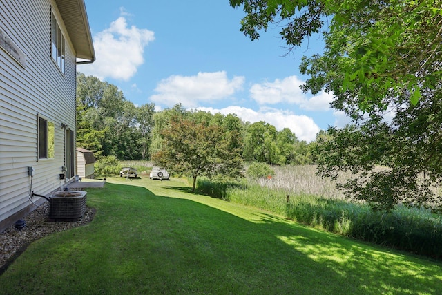 6875 148th Ln NW, Ramsey, MN 55303 - view of green lawn with central air condition unit