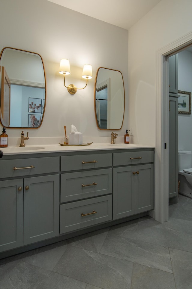 38525 Northstar Dr, Cushing, MN 56443 - bathroom with double vanity, toilet, and a sink