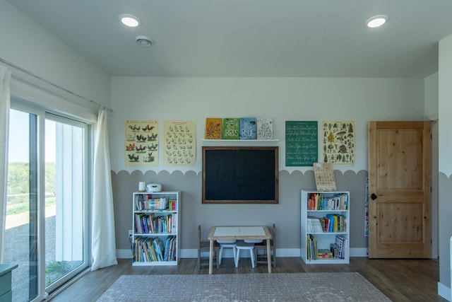 38525 Northstar Dr, Cushing, MN 56443 - playroom with recessed lighting, visible vents, baseboards, and wood finished floors