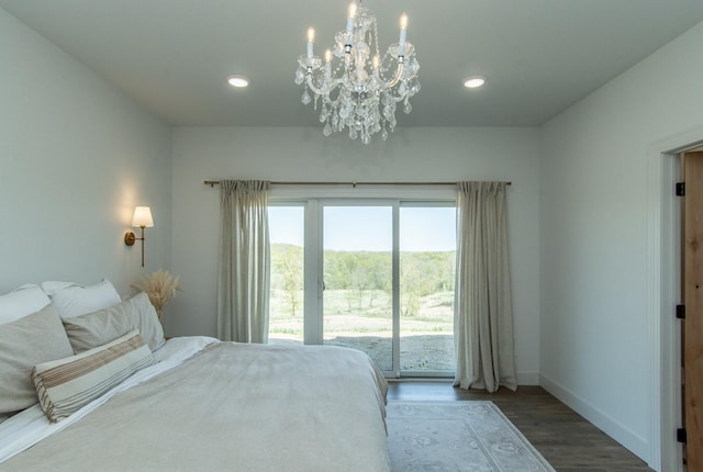 38525 Northstar Dr, Cushing, MN 56443 - bedroom with an inviting chandelier, wood finished floors, access to exterior, and recessed lighting