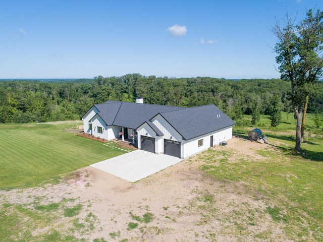 38525 Northstar Dr, Cushing, MN 56443 - drone / aerial view with a wooded view