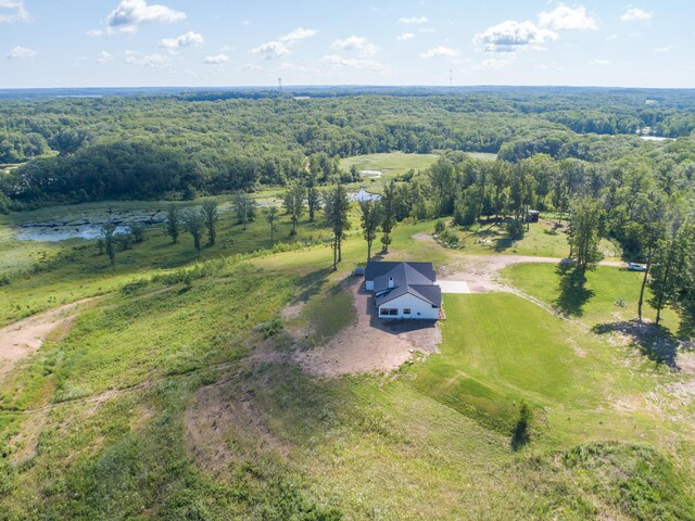 38525 Northstar Dr, Cushing, MN 56443 - birds eye view of property with a wooded view