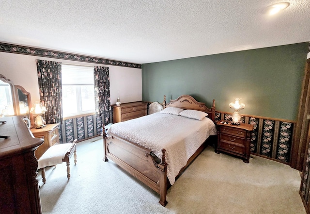 7331 175th Ave NW, Ramsey, MN 55303 - bedroom with light carpet and a textured ceiling