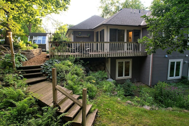 17180 Jordan Ct, Lakeville, MN 55044 - rear view of house featuring a deck, stairway, and a shingled roof