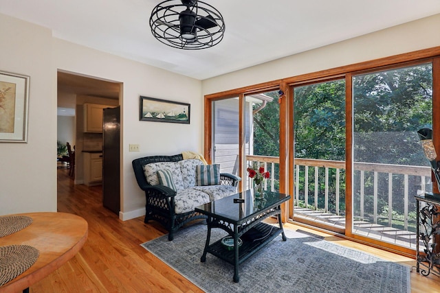 17180 Jordan Ct, Lakeville, MN 55044 - living room with plenty of natural light, light wood finished floors, and baseboards