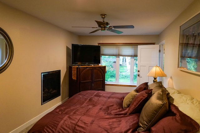 17180 Jordan Ct, Lakeville, MN 55044 - bedroom with baseboards and a ceiling fan