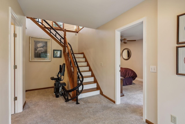 17180 Jordan Ct, Lakeville, MN 55044 - stairs featuring carpet flooring and baseboards