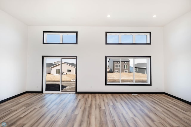 6741 67th Ave S, Horace, ND 58047 - empty room featuring wood finished floors and recessed lighting