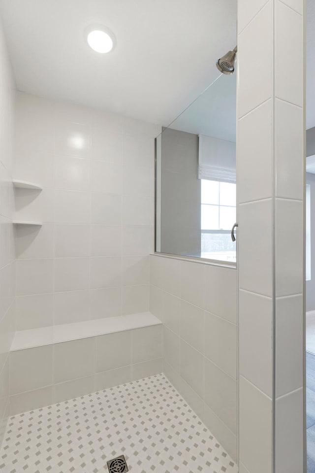 full bathroom featuring a shower stall
