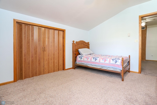 929 16th St N, Moorhead, MN 56560 - bedroom featuring carpet, vaulted ceiling, a closet, and baseboards