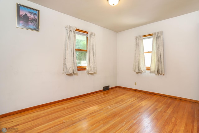 929 16th St N, Moorhead, MN 56560 - empty room with wood finished floors and baseboards