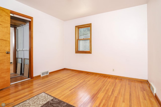 929 16th St N, Moorhead, MN 56560 - empty room featuring wood finished floors and baseboards