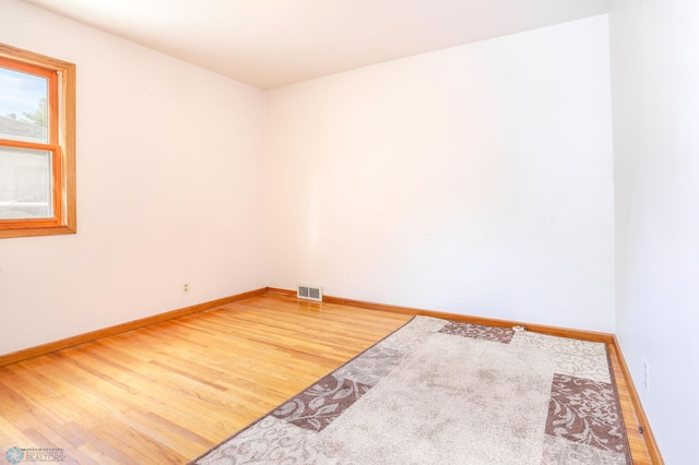 929 16th St N, Moorhead, MN 56560 - spare room with wood finished floors and baseboards