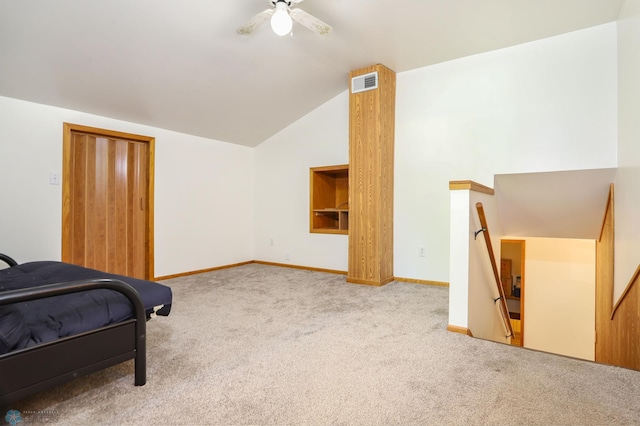 929 16th St N, Moorhead, MN 56560 - carpeted bedroom with vaulted ceiling, baseboards, and ceiling fan
