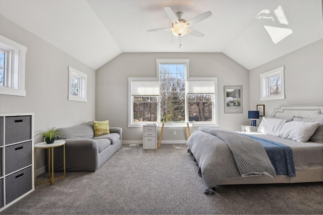 carpeted bedroom with baseboards, a ceiling fan, and lofted ceiling