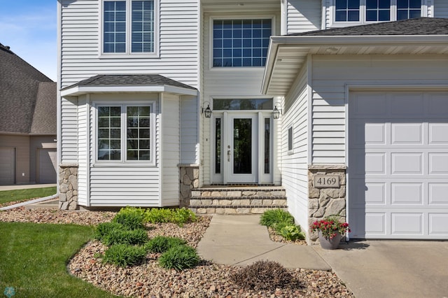 entrance to property featuring stone siding