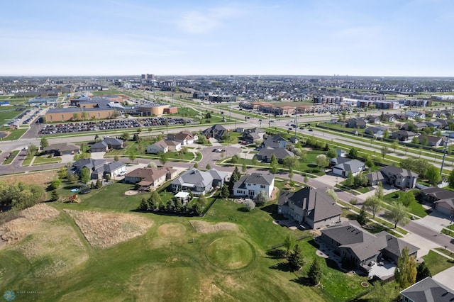 aerial view of property's location featuring nearby suburban area