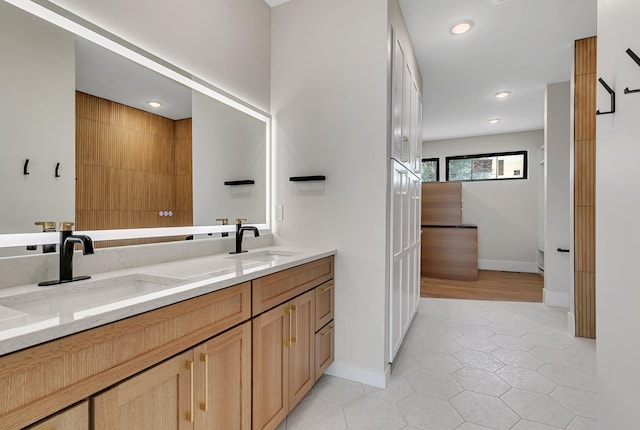 11694 Indian Beach Rd, Spicer, MN 56288 - full bath with double vanity, tile patterned floors, and recessed lighting