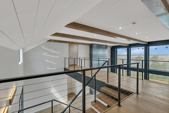 11694 Indian Beach Rd, Spicer, MN 56288 - corridor featuring wood finished floors, recessed lighting, an upstairs landing, and a wood ceiling with exposed beams